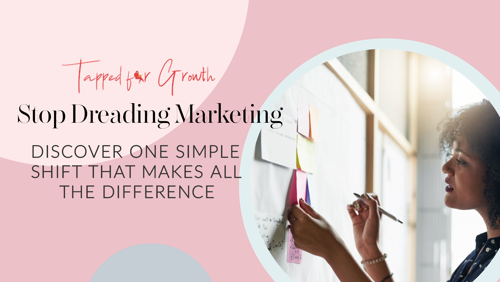 woman adding marketing strategy sticky notes to wall
